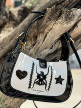 Borsa bianca e nera vernice